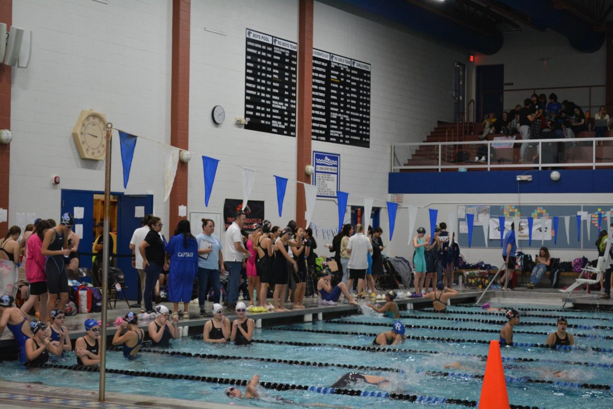 Girls Swim and Dive wins leagues; Swimmers qualify for state competition