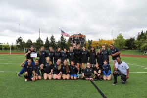 The Unified soccer team gathers after a hard earned win against Northville High School. Photo contributed by Julie Zapoluch