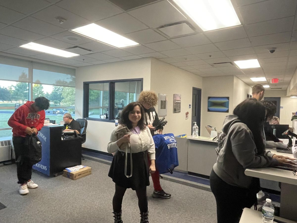 Students enter the Welcome Center late and sign in. Large  numbers of tardy students forced administration to assign  lunch detentions.